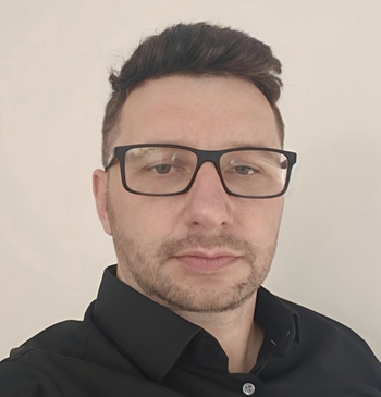 https://www.systemsdk.com/wp-content/uploads/2025/10/alex-protsenko.jpg